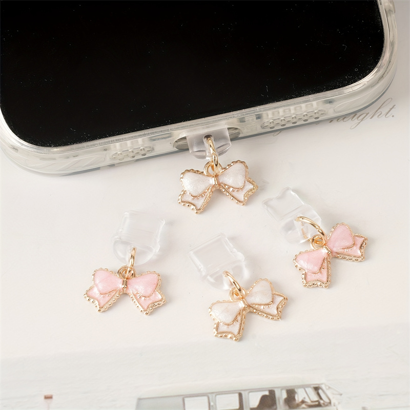 จุกปิดกันฝุ่นรูปโบว์สีชมพูขาวส - Mobile Tech Accessories บทวิจารณ์และราคา
